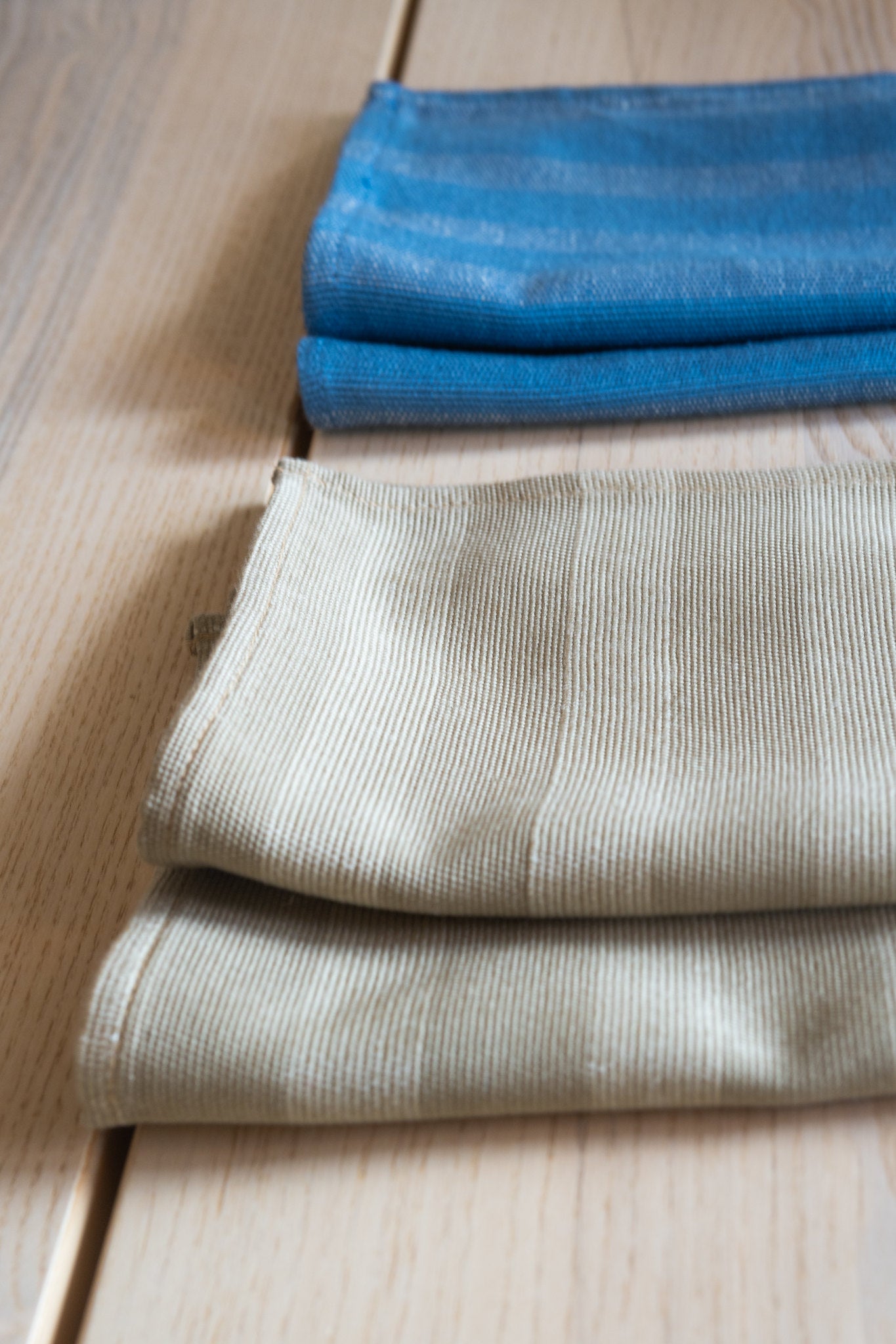 Cream set of napkins and blue set of consciously crafted napkins 