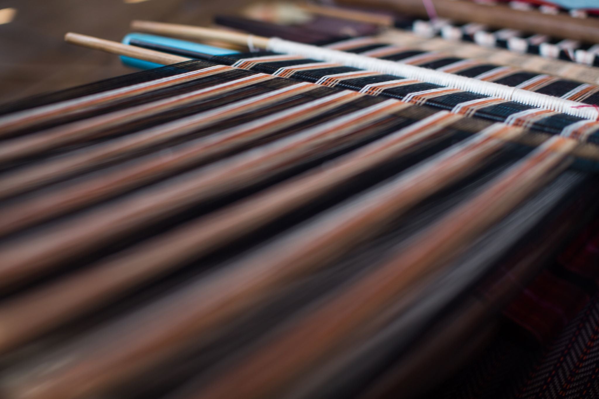 Close up photo of a handmade weaving loom